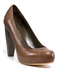 In gleaming leather with a wooden heel, these Loeffler Randall pumps bring fall's baroque style down to earth. By Loeffler Randall. In gleaming leather with a wooden heel, these Loeffler Randall pumps bring fall's baroque style down to earth. By Loeffler Randall.