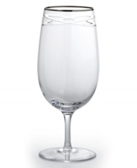 Commemorate a special anniversary with a simply elegant reminder of the time you said, I do. This radiant crystal iced beverage glass is hand-engraved with interlocking bands that symbolize the rings exchanged between bride and groom. A platinum rim provides a graceful finish.