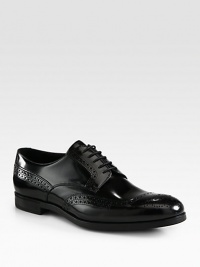 Leather wing-tip style with perforations for a detailed finish.Leather upperLeather liningLeather soleMade in Italy