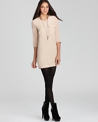 A silk French Connection dress featuring stylish three-quarter sleeves in a classic shirtdress silhouette for elegant-ease. A silk French Connection dress featuring stylish three-quarter sleeves in a classic shirtdress silhouette for elegant-ease.