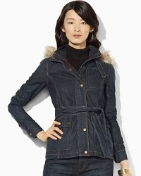 A rugged denim jacket is designed with a detachable faux-fur-trimmed hood and a flattering belted waist. A rugged denim jacket is designed with a detachable faux-fur-trimmed hood and a flattering belted waist.