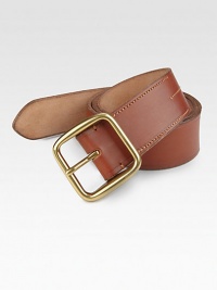 An essential wardrobe accessory rendered in burnished leather with stitch detail and rounded brass hardware.LeatherAbout 2 wideMade in Italy An essential wardrobe accessory rendered in burnished leather with stitch detail and rounded brass hardware.LeatherAbout 2 wideMade in Italy