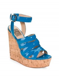THE LOOKOpen toe Crisscrossing patent leather straps Adjustable ankle strapTHE FITCork wedge heel, 5¾ (145mm) Cork platform, 1½ (40mm) Compares to a 4¼ heel (110mm)THE MATERIALPatent leather upper Leather lining and sole Padded insoleORIGINImported THE LOOKOpen toe Crisscrossing patent leather straps Adjustable ankle strapTHE FITCork wedge heel, 5¾ (145mm) Cork platform, 1½ (40mm) Compares to a 4¼ heel (110mm)THE MATERIALPatent leather upper Leather lining and sole Padded insoleORIGINImported
