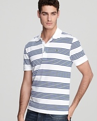 A clean-cut look for lunch with the in-laws, or when you need to polish up a weekend afternoon, this Lacoste polo is a surefire winner. A clean-cut look for lunch with the in-laws, or when you need to polish up a weekend afternoon, this Lacoste polo is a surefire winner.
