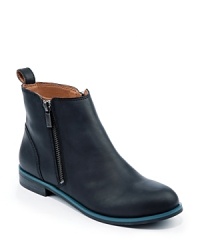 Lucky Brand steps up the style quotient on these basic booties with a bright pop of color at the sole. Lucky Brand steps up the style quotient on these basic booties with a bright pop of color at the sole.