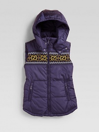 A quilted vest in waterproof nylon and wool trim with hood, zip pockets and GG Nordic jacquard pattern at the chest.Attached hood with double snap closureSleevelessFull-zip frontTwo zip pocketsFully linedBody: nylonTrim: woolDry cleanMade in Italy A quilted vest in waterproof nylon and wool trim with hood, zip pockets and GG Nordic jacquard pattern at the chest.Attached hood with double snap closureSleevelessFull-zip frontTwo zip pocketsFully linedBody: nylonTrim: woolDry cleanMade in Italy