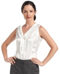 A perfect accompaniment to any suit, Nine West's satin charmuese shell features an elegant ruffle collar. A perfect accompaniment to any suit, Nine West's satin charmuese shell features an elegant ruffle collar.