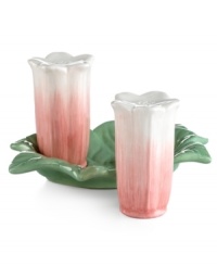 A dash of whimsy. Geneva salt and pepper shakers are plucked right from the garden, featuring sweet flower shapes nestled in a leaf-green dish from Martha Stewart Collection. A dash of whimsy. Geneva salt and pepper shakers are plucked right from the garden, featuring sweet flower shapes nestled in a leaf-green dish from Martha Stewart Collection.