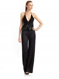 THE LOOKBeaded halter strapV-neckBead and sequin detailsSheer smocked backBack zip closureTHE FITAbout 15 from shoulder to hemTHE MATERIALNylonSilk linedCARE & ORIGINDry cleanMade in ItalyModel shown is 5'10½ (179cm) wearing US size 4. THE LOOKBeaded halter strapV-neckBead and sequin detailsSheer smocked backBack zip closureTHE FITAbout 15 from shoulder to hemTHE MATERIALNylonSilk linedCARE & ORIGINDry cleanMade in ItalyModel shown is 5'10½ (179cm) wearing US size 4.