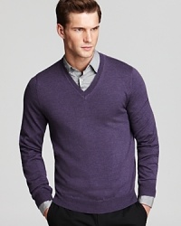 Sharpen your presentation with a handsome V-neck in premium merino wool, a luxe addition to your sweater drawer. Sharpen your presentation with a handsome V-neck in premium merino wool, a luxe addition to your sweater drawer.