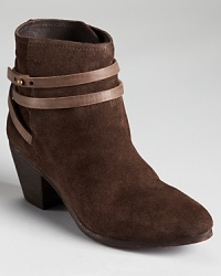 Ash gets sophisticated with the Nikita bootie--a small package with style that's hard to miss. In soft black suede, these boots get edgy with wrapped leather details. Ash gets sophisticated with the Nikita bootie--a small package with style that's hard to miss. In soft black suede, these boots get edgy with wrapped leather details.
