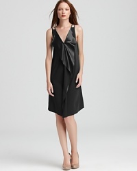 Lush silk takes on versatile style in this front-to-back reversible dress from Sachin + Babi. Team with neutral heels for an elegant statement. Lush silk takes on versatile style in this front-to-back reversible dress from Sachin + Babi. Team with neutral heels for an elegant statement.