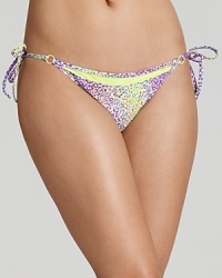 Vamp it up while you bask in this printed bikini from Nanette Lepore. Its playful print and cute cut are sure to make waves whether you're poolside or somewhere tropical. Vamp it up while you bask in this printed bikini from Nanette Lepore. Its playful print and cute cut are sure to make waves whether you're poolside or somewhere tropical.