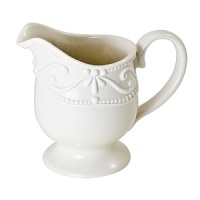 Feminine and sophisticated. Off-white porcelain body with white embossing. Dishwasher and microwave safe. Feminine and sophisticated. Off-white porcelain body with white embossing. Dishwasher and microwave safe.