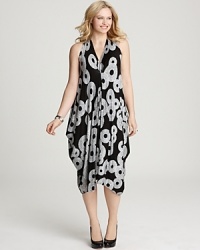 This Rachel Pally White Label caftan is all about divine drape--a fan-flower print lends a touch of exotic elegance to this singular look. This Rachel Pally White Label caftan is all about divine drape--a fan-flower print lends a touch of exotic elegance to this singular look.