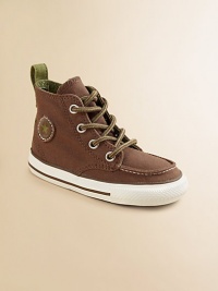 A classic high-top, lace-up design with Chuck Taylor insole and rubber sole, crafted in sturdy canvas.Lace-upCanvas upperTextile liningRubber soleTraditional chuck insoleImported A classic high-top, lace-up design with Chuck Taylor insole and rubber sole, crafted in sturdy canvas.Lace-upCanvas upperTextile liningRubber soleTraditional chuck insoleImported