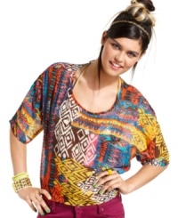 Add tribal flavor to your wardrobe of fun, summery tops with this printed, semi-sheer style from Material Girl! Add tribal flavor to your wardrobe of fun, summery tops with this printed, semi-sheer style from Material Girl!