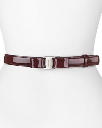 With it's slick patent leather and feminine bow detailing, Salvatore Ferragamo's leather belt lends every look polished sophistication. With it's slick patent leather and feminine bow detailing, Salvatore Ferragamo's leather belt lends every look polished sophistication.