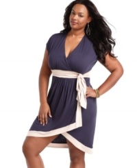 Wrap up a stunning look with ING's short sleeve plus size dress, accented by contrasting trim. Wrap up a stunning look with ING's short sleeve plus size dress, accented by contrasting trim.