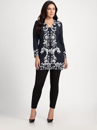 An elegant and strategically placed print gives this knit charming appeal. This design features an elongating silhouette you will love.V-necklineLong sleevesBanded cuffsElasticized waistBanded hemPull-on styleAbout 31 from shoulder to hemViscose/LycraDry cleanMade in Italy An elegant and strategically placed print gives this knit charming appeal. This design features an elongating silhouette you will love.V-necklineLong sleevesBanded cuffsElasticized waistBanded hemPull-on styleAbout 31 from shoulder to hemViscose/LycraDry cleanMade in Italy