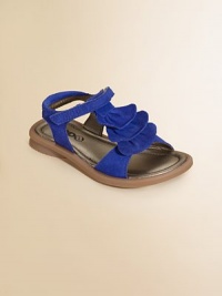 A sweet pair of cozy sandals is given a pretty update with tiers of ruffles.Grip-tape closureLeather upperLeather liningRubber solePadded insoleImported A sweet pair of cozy sandals is given a pretty update with tiers of ruffles.Grip-tape closureLeather upperLeather liningRubber solePadded insoleImported