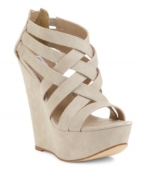 Exceptional beauty. Steve Madden Women's Xcess platform wedge sandals take caged vamps and wedge heels to new heights. And the results are amazing. Exceptional beauty. Steve Madden Women's Xcess platform wedge sandals take caged vamps and wedge heels to new heights. And the results are amazing.