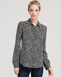 Our obsession with bold animal prints continues with this chic leopard-printed Theory top, rendered in pure silk. Our obsession with bold animal prints continues with this chic leopard-printed Theory top, rendered in pure silk.