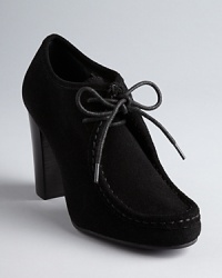 Lauren Ralph Lauren gives lace up chukka booties a luxe twist in velvety suede on stacked heels. Lauren Ralph Lauren gives lace up chukka booties a luxe twist in velvety suede on stacked heels.