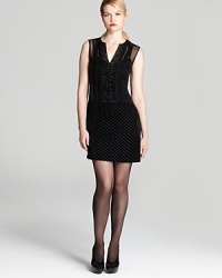 Polished and poised for primetime glamour, this exquisitely-detailed Nanette Lepore dress enriches a classic silhouette with an edgy velvet burnout pattern and a rush of ruffles on top. Polished and poised for primetime glamour, this exquisitely-detailed Nanette Lepore dress enriches a classic silhouette with an edgy velvet burnout pattern and a rush of ruffles on top.