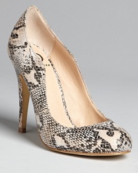 Sensual curves combined with snakeskin-embossed uppers set this pair of Kelsi Dagger pumps apart: Exotically appealing. Sensual curves combined with snakeskin-embossed uppers set this pair of Kelsi Dagger pumps apart: Exotically appealing.