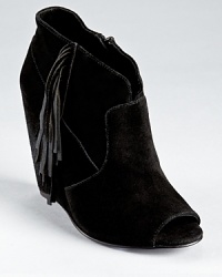 A peep toe bootie gets the fringe treatment on STEVEN BY STEVE MADDEN's soft suede Samaraa wedges. A peep toe bootie gets the fringe treatment on STEVEN BY STEVE MADDEN's soft suede Samaraa wedges.
