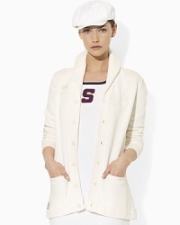 Celebrate the heritage of vintage athletic style and the USA's participation in the 2012 Summer Olympics with this weathered fleece cardigan, accented with tonal USA embroidery. Celebrate the heritage of vintage athletic style and the USA's participation in the 2012 Summer Olympics with this weathered fleece cardigan, accented with tonal USA embroidery.