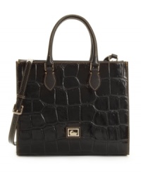 Embossed with a richly textured crocodile pattern, the leather Jenine purse by Dooney & Bourke achieves a bold beauty.