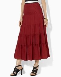 Rendered on soft woven cotton, the Moriah exudes rich femininity in a flowing, tiered silhouette. Rendered on soft woven cotton, the Moriah exudes rich femininity in a flowing, tiered silhouette.