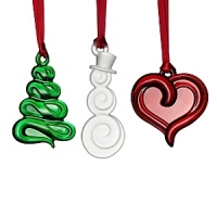 New for 2012! Celebrate the season with this set of three whimsical crystal ornaments from Orrefors including a Christmas tree, a snowman and a bright red heart. New for 2012! Celebrate the season with this set of three whimsical crystal ornaments from Orrefors including a Christmas tree, a snowman and a bright red heart.