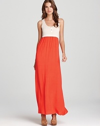 Whether dressed up with sky-high heels or laid-back with sleek sandals, this two-tone Splendid maxi dress epitomizes vibrant summer style. Whether dressed up with sky-high heels or laid-back with sleek sandals, this two-tone Splendid maxi dress epitomizes vibrant summer style.