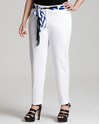 Tie up your pants portfolio in these DKNYC slim pants, designed in a trend-right narrow silhouette and finished at the waist with a striped, silky scarf. Tie up your pants portfolio in these DKNYC slim pants, designed in a trend-right narrow silhouette and finished at the waist with a striped, silky scarf.