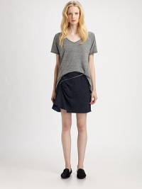 Fluid slub jersey, cut to fall beautifully over the body.V necklineShort sleevesContour seamingAsymmetrical hemFront, about 22 from shoulder to hemBack, about 28 from shoulder to hem50% polyester/38% cotton/12% rayonDry cleanMade in USAModel shown is 5'10 (177cm) wearing US size Small. Fluid slub jersey, cut to fall beautifully over the body.V necklineShort sleevesContour seamingAsymmetrical hemFront, about 22 from shoulder to hemBack, about 28 from shoulder to hem50% polyester/38% cotton/12% rayonDry cleanMade in USAModel shown is 5'10 (177cm) wearing US size Small.