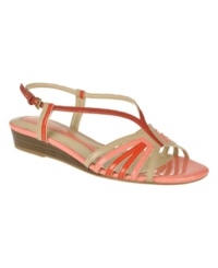 A rainbow of retro style. The Joany demi-wedge sandals by Naturalizer recall the 70s with their colorful straps and easy heel. A rainbow of retro style. The Joany demi-wedge sandals by Naturalizer recall the 70s with their colorful straps and easy heel.
