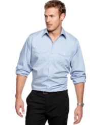 Solid decision maker. Convey confidence anywhere you're at in this handsome dress shirt from Calvin Klein. Solid decision maker. Convey confidence anywhere you're at in this handsome dress shirt from Calvin Klein.