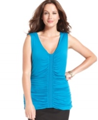 A ruched front lends a slimming shape to Alfani's sleeveless plus size top-- wear it alone or as a layer. A ruched front lends a slimming shape to Alfani's sleeveless plus size top-- wear it alone or as a layer.