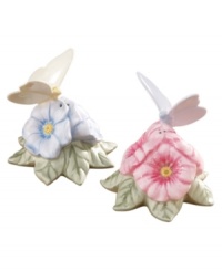 A bountiful spring garden adorns your table with this delightful set of salt and pepper shakers. The porcelain pair includes a bright pink poppy salt shaker and blue pepper shaker, each adorned with a fluttering butterfly handle. A bountiful spring garden adorns your table with this delightful set of salt and pepper shakers. The porcelain pair includes a bright pink poppy salt shaker and blue pepper shaker, each adorned with a fluttering butterfly handle.