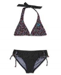 Make her style stand out in this reverse halter top two-piece set from Roxy. Make her style stand out in this reverse halter top two-piece set from Roxy.