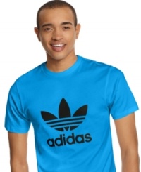 Keep it clean and classic with the iconic retro look of the adidas trefoil, taking center stage on this everyday cotton jersey T shirt. Keep it clean and classic with the iconic retro look of the adidas trefoil, taking center stage on this everyday cotton jersey T shirt.