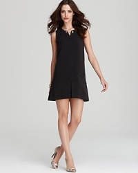 For the minimalist at heart, this Juicy Couture dress masters understated elegance with a clean, black silhouette. Put a shine on the style with metallic accents. For the minimalist at heart, this Juicy Couture dress masters understated elegance with a clean, black silhouette. Put a shine on the style with metallic accents.