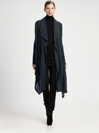 Finespun wool jersey, in a long, artfully draped asymmetrical style.Draped collarLong sleevesAsymmetrical hemlineAbout 32 from shoulder to hemWoolDry cleanImported of Italian fabricModel shown is 5'10 (177cm) wearing US size Small. Finespun wool jersey, in a long, artfully draped asymmetrical style.Draped collarLong sleevesAsymmetrical hemlineAbout 32 from shoulder to hemWoolDry cleanImported of Italian fabricModel shown is 5'10 (177cm) wearing US size Small.