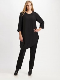 Made from sumptuous matte silk, a relaxed-fit top with a fashion-forward hem. Slim-fitting pants would look incredible with this design.Round neckSlit at three-quarter sleevesFrench dartsDraped hemAbout 35 from shoulder to hemSilkDry cleanImported Made from sumptuous matte silk, a relaxed-fit top with a fashion-forward hem. Slim-fitting pants would look incredible with this design.Round neckSlit at three-quarter sleevesFrench dartsDraped hemAbout 35 from shoulder to hemSilkDry cleanImported