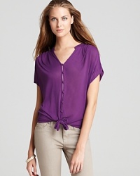 Showcase one of the season's richest colors with this Soft Joie top in a deep purple hue. Pair this relaxed top with a comfortable pair of jeans, or dress it up with sleek leather leggings. Showcase one of the season's richest colors with this Soft Joie top in a deep purple hue. Pair this relaxed top with a comfortable pair of jeans, or dress it up with sleek leather leggings.