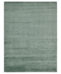 Skilled hand-carving creates an absorbing geometric block pattern on this premium Nourison area rug. Crafted with the timeless art of Tibetan hand-knotting, this deep blue piece features a soft blend of wool and Luxcelle fibers for a distinctive, satiny texture and sheen. (Clearance) Skilled hand-carving creates an absorbing geometric block pattern on this premium Nourison area rug. Crafted with the timeless art of Tibetan hand-knotting, this deep blue piece features a soft blend of wool and Luxcelle fibers for a distinctive, satiny texture and sheen. (Clearance)