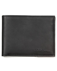 Carry your everyday essentials in this refined signature wallet, an exceptional offering in rarefied leather from Salvatore Ferragamo. Carry your everyday essentials in this refined signature wallet, an exceptional offering in rarefied leather from Salvatore Ferragamo.